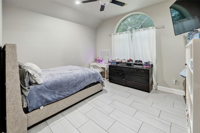 bedroom with ceiling fan and lofted ceiling