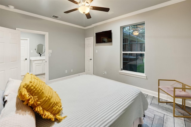 bedroom with light hardwood / wood-style floors, ensuite bath, ceiling fan, and ornamental molding