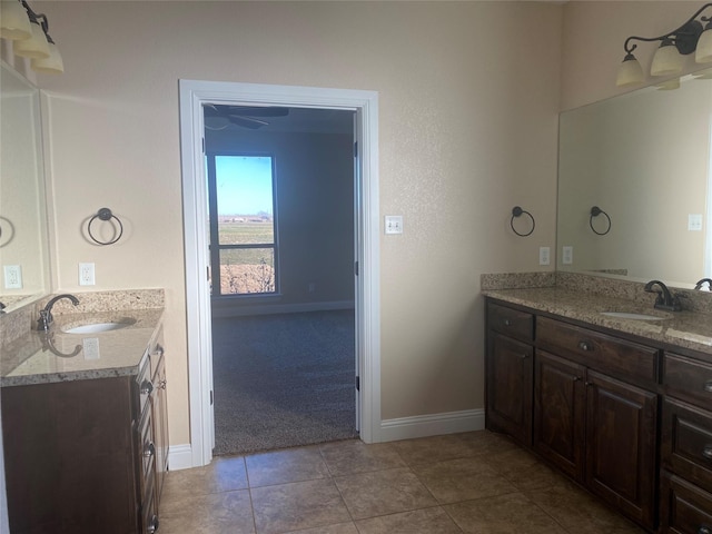 bathroom featuring vanity and tile patterned flooring