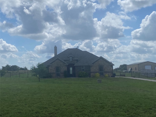 view of front of house featuring a front yard