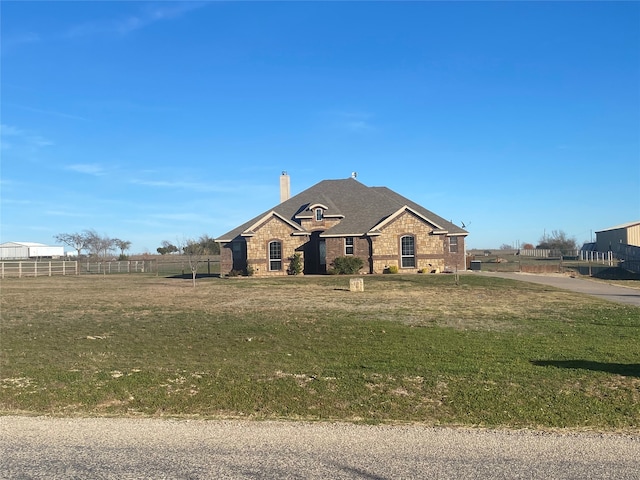 view of front of house featuring a front yard