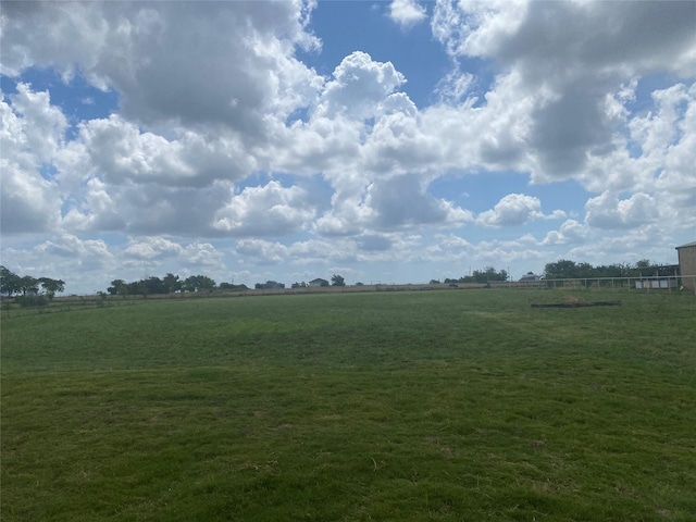 exterior space with a rural view