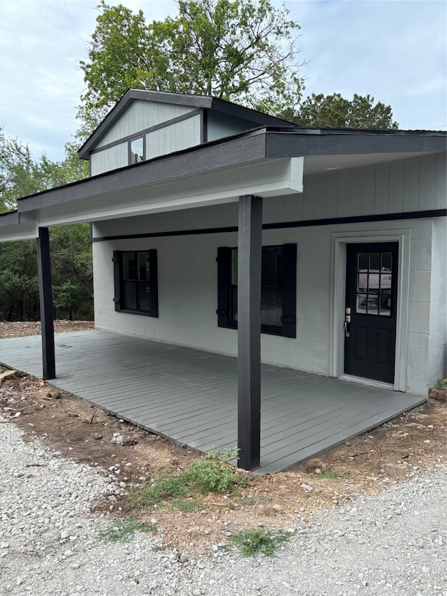 view of home's exterior featuring covered porch