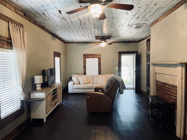 living room featuring ceiling fan, wood ceiling, dark hardwood / wood-style flooring, and ornamental molding