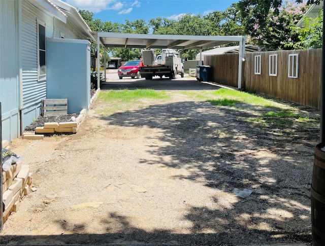 view of yard with a carport