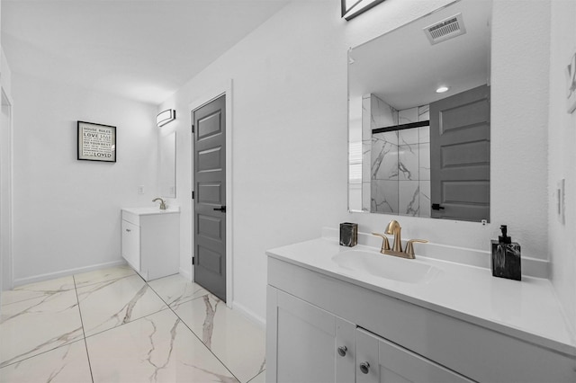 bathroom with vanity and walk in shower