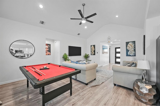 rec room featuring hardwood / wood-style flooring, ceiling fan, vaulted ceiling, and billiards