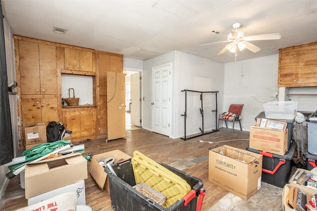 storage area with ceiling fan