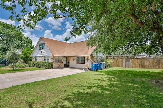 cape cod home with a front lawn