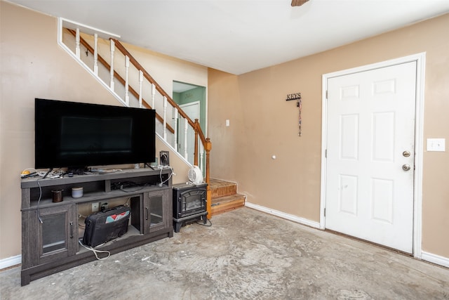 living room featuring concrete flooring