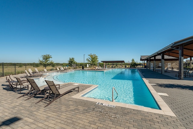 view of pool featuring a patio area