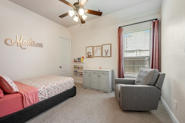 bedroom featuring light colored carpet, ceiling fan, and lofted ceiling