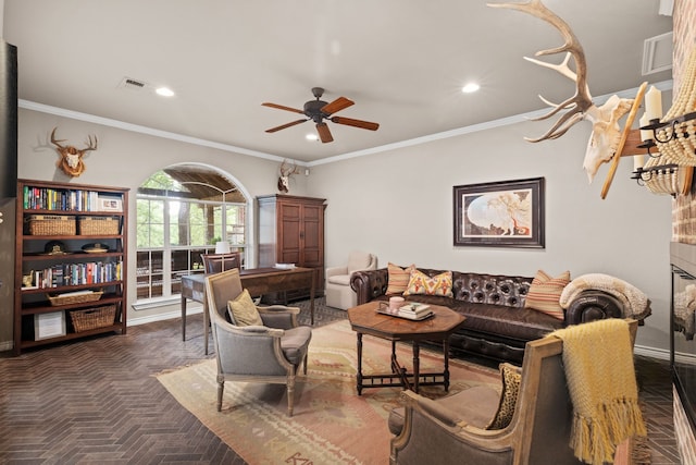 living room featuring ornamental molding, visible vents, and recessed lighting