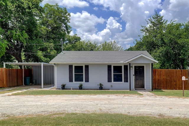 view of front facade featuring a carport