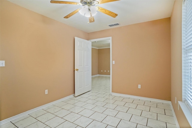 empty room featuring ceiling fan