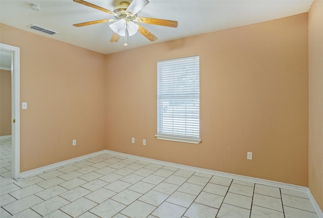 empty room featuring ceiling fan