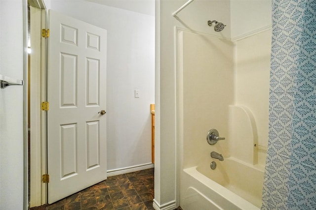 bathroom featuring vanity and shower / bath combination