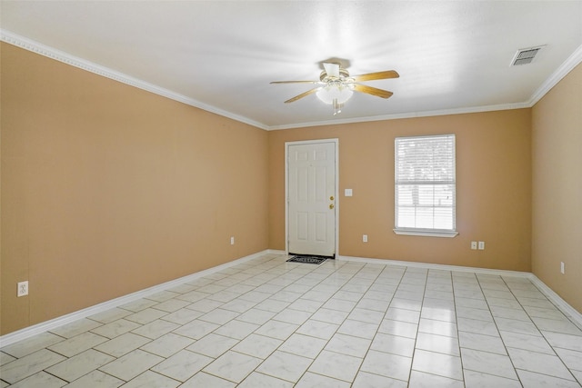 empty room featuring crown molding and ceiling fan