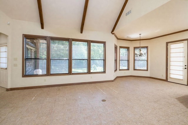 empty room featuring beam ceiling and a chandelier