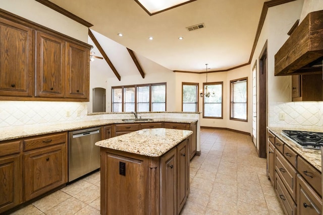 kitchen with backsplash, ventilation hood, appliances with stainless steel finishes, a kitchen island, and kitchen peninsula