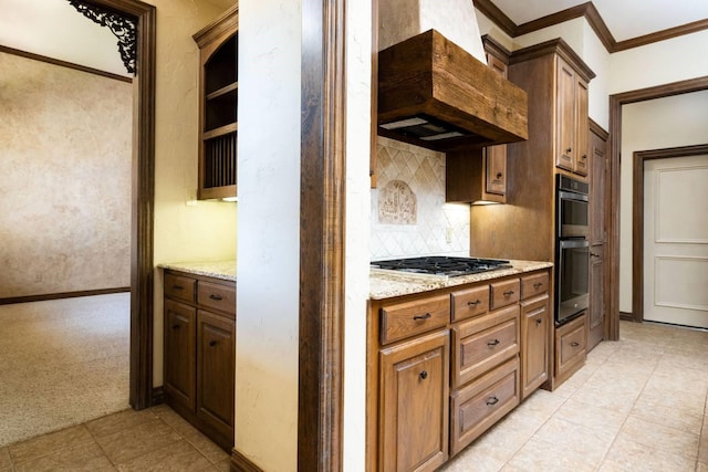 kitchen featuring light stone countertops, appliances with stainless steel finishes, light carpet, premium range hood, and crown molding