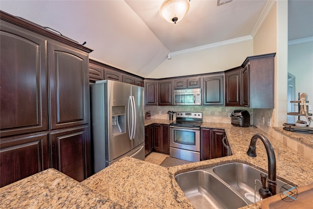 kitchen featuring stainless steel appliances, light stone counters, sink, tasteful backsplash, and light tile floors