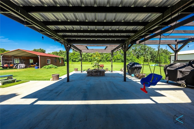 view of patio featuring a fire pit