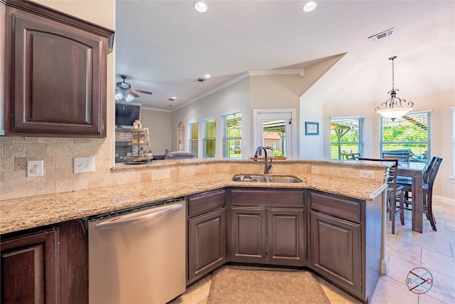 kitchen with light tile flooring, kitchen peninsula, ceiling fan, stainless steel dishwasher, and sink