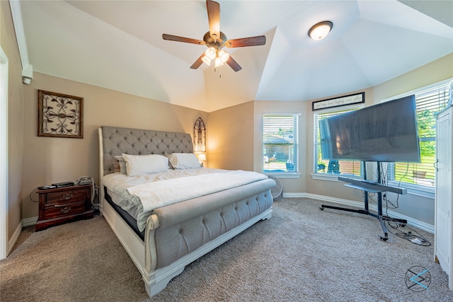 carpeted bedroom featuring lofted ceiling and ceiling fan