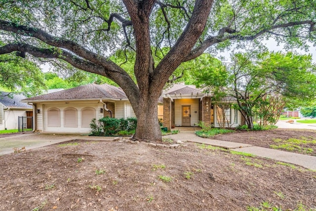 view of front of property featuring a garage