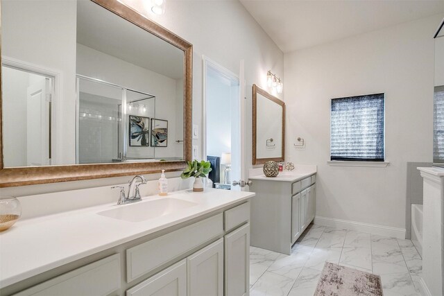 bathroom with vanity and independent shower and bath