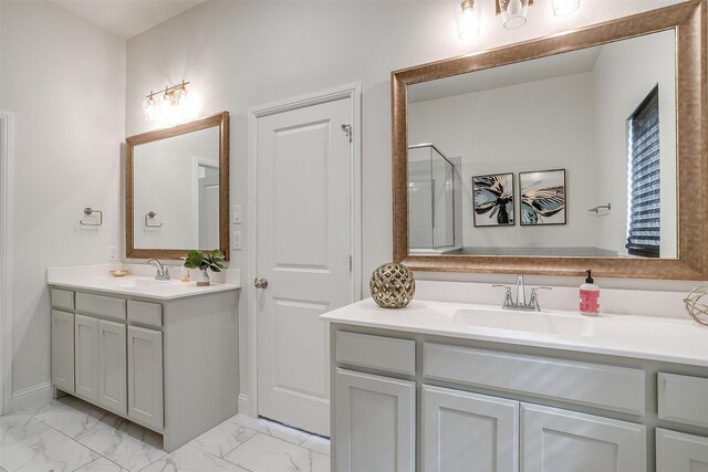 bathroom featuring an enclosed shower and vanity