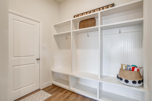 mudroom with hardwood / wood-style flooring