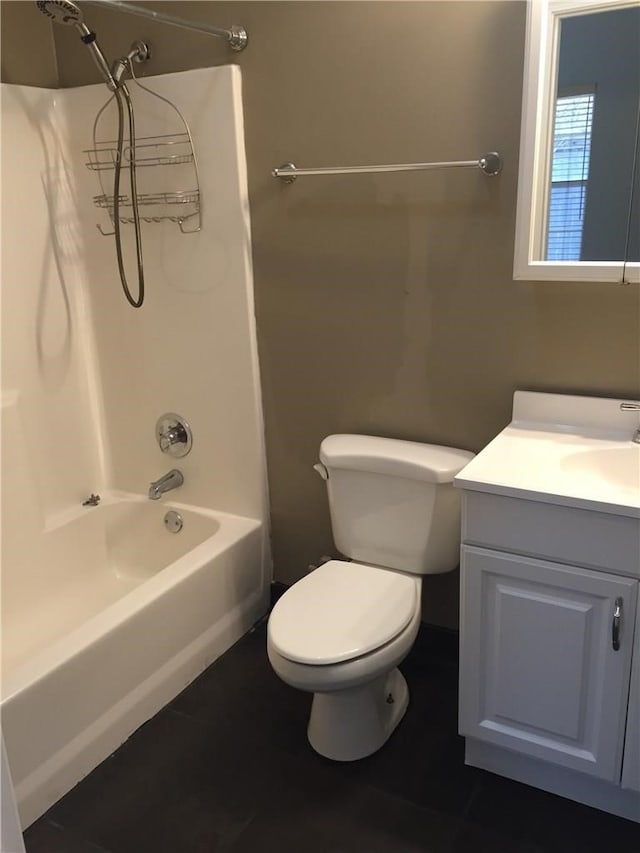 full bathroom with shower / washtub combination, vanity, and toilet