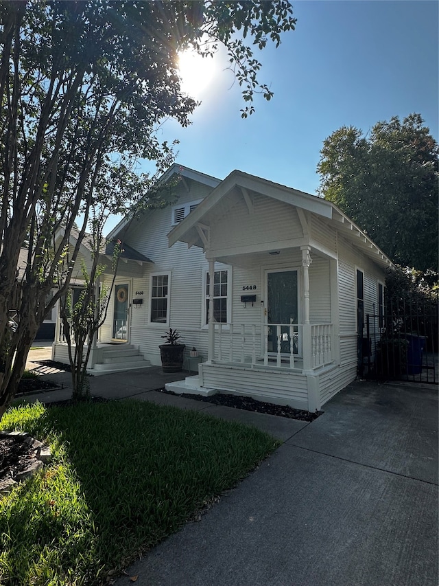 view of front of home featuring covered porch