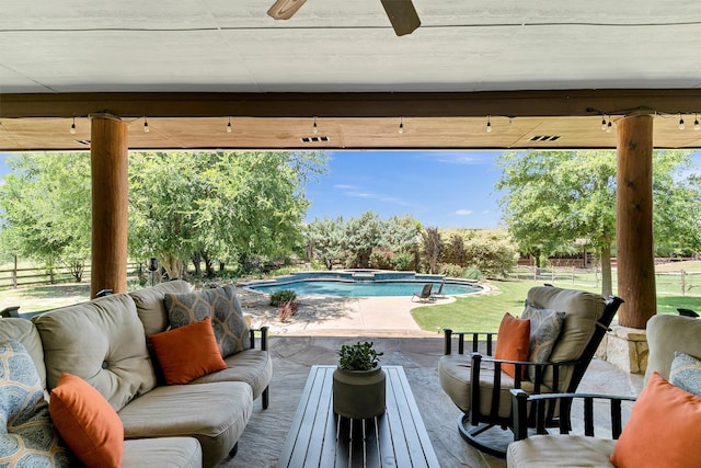 view of swimming pool featuring an outdoor living space and a patio