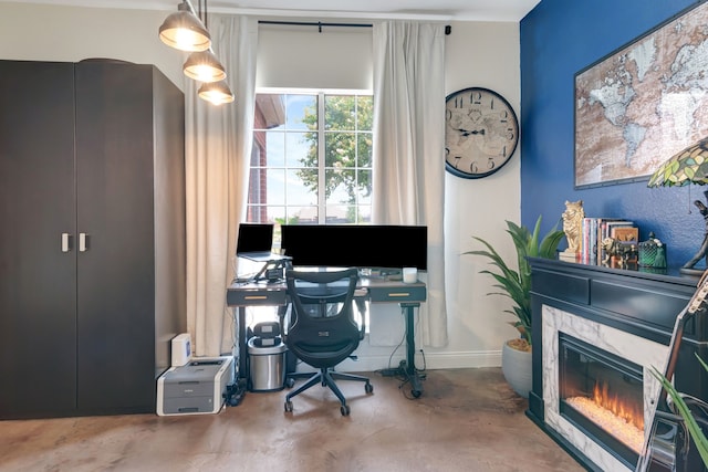 office featuring a fireplace