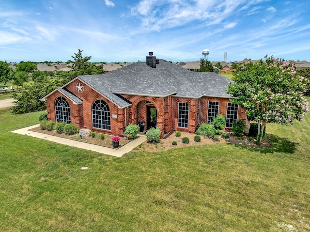 ranch-style home with a front yard