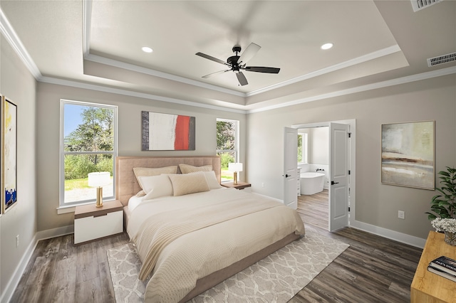 bedroom featuring ornamental molding, a raised ceiling, ceiling fan, and dark wood-type flooring