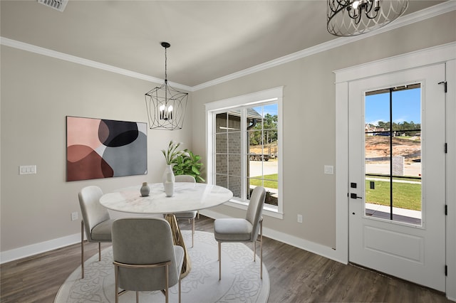 dining space featuring dark hardwood / wood-style floors and a healthy amount of sunlight