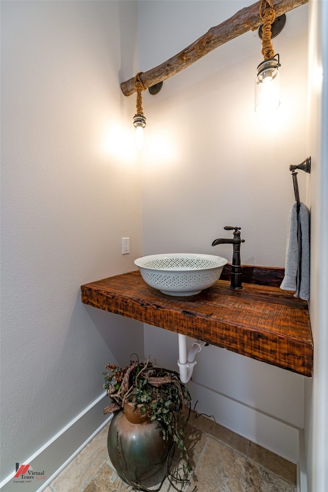 bathroom featuring tile patterned floors and sink