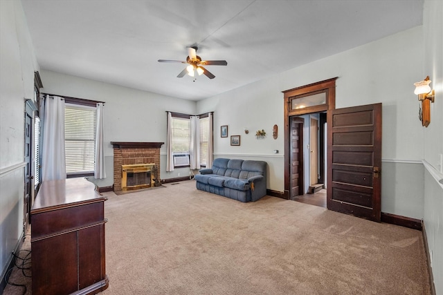 carpeted living room featuring a brick fireplace, ceiling fan, and cooling unit