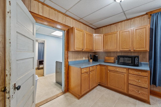 kitchen with a paneled ceiling