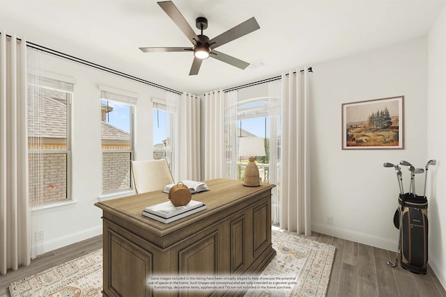 office area with hardwood / wood-style floors and ceiling fan