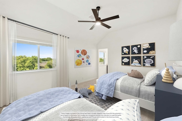 carpeted bedroom with ceiling fan and lofted ceiling