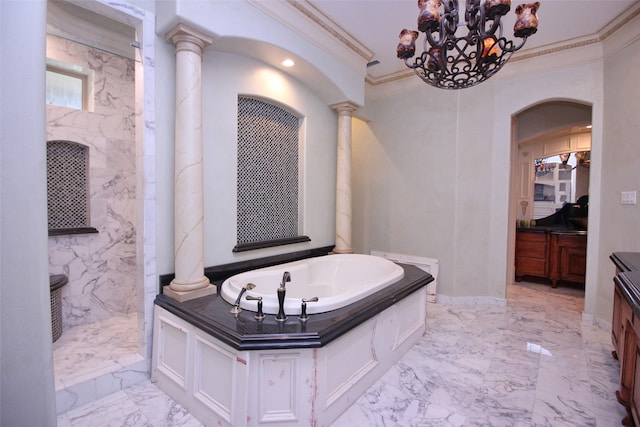 bathroom featuring a tub, an inviting chandelier, tile floors, ornamental molding, and vanity