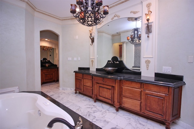 bathroom with an inviting chandelier, crown molding, tile flooring, a bath, and vanity