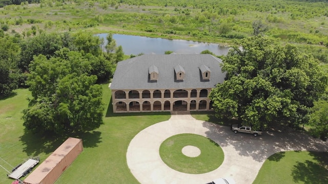 drone / aerial view with a water view