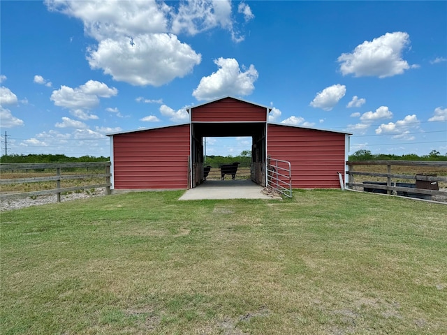 view of outbuilding with a rural view