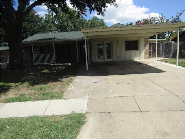 view of front of house with a carport